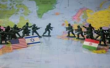 The headlines arrive faster than anyone can process them. Missile strikes. Warnings of retaliation. Oil markets jolt as tensions rise around the Strait of Hormuz. Governments scramble to evacuate citizens. Across television studios and diplomatic corridors, the same uneasy question returns: when will this conflict stop?